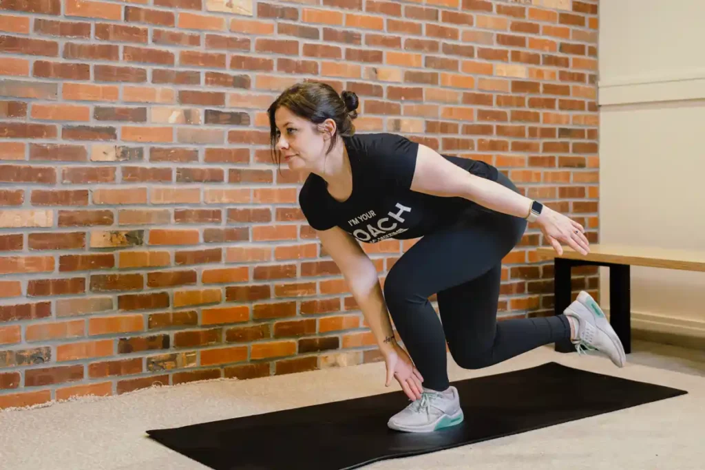 Tone Your Arms in Just One Week: Achieve Results Without the Gym! 1 A person exercising their arms at home with light weights Ashtead