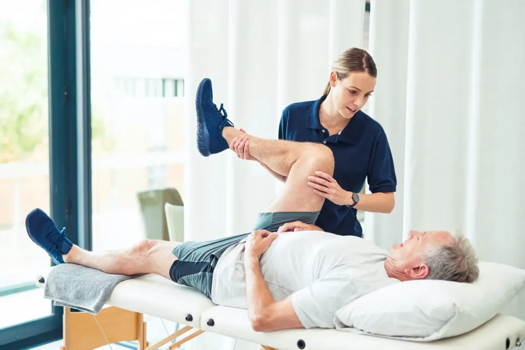 Revitalising Recovery: Effective Rehabilitation Strategies for Muscle Injuries 3 Physiotherapist assisting a patient with muscle recovery exercises Ashtead