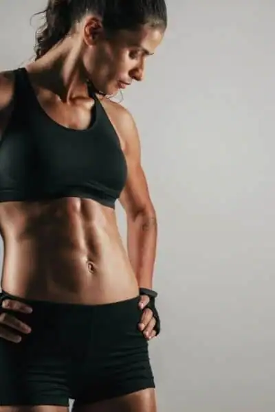 Toning Up at Home: The Ultimate Guide to Bodyweight Exercises 2 Image of woman's toned stomach after bodyweight exercises Ashtead and non-surgical treatment from Lipo 360