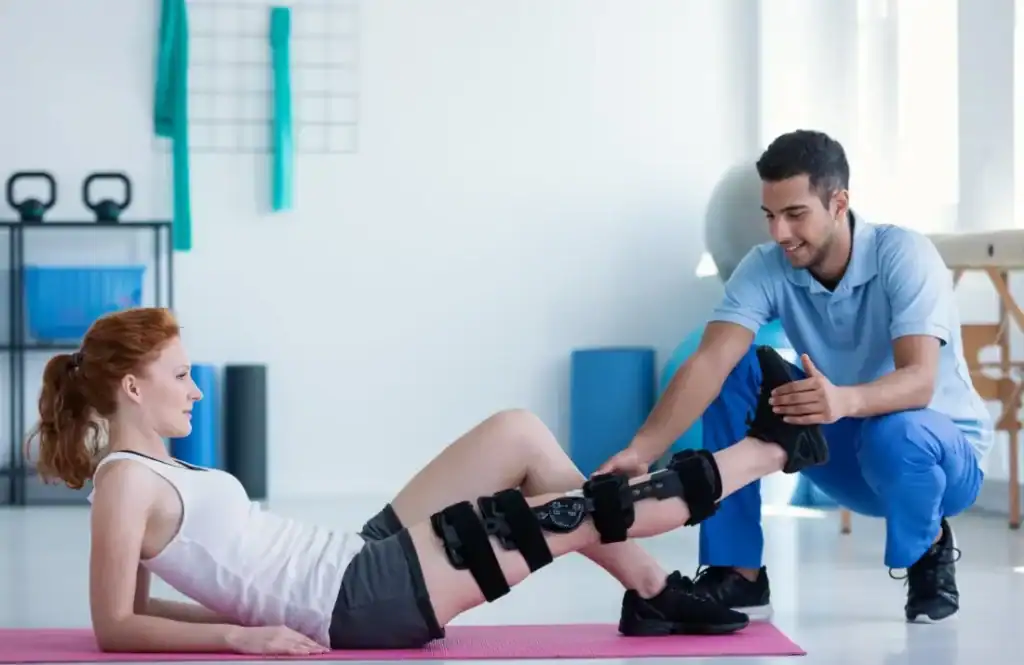 Woman having treatment to help muscle recovery Ashtead after an injury