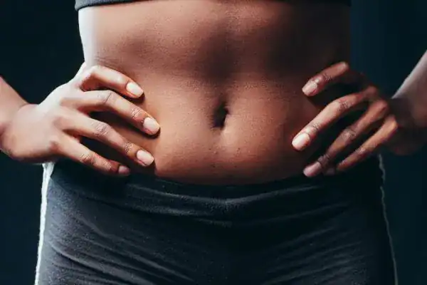 Toning Your Stomach: The Ultimate Guide to Achieving a Sculpted Stomach While Shedding Pounds 1 Image of a toned stomach after non surgical treatment Ashtead